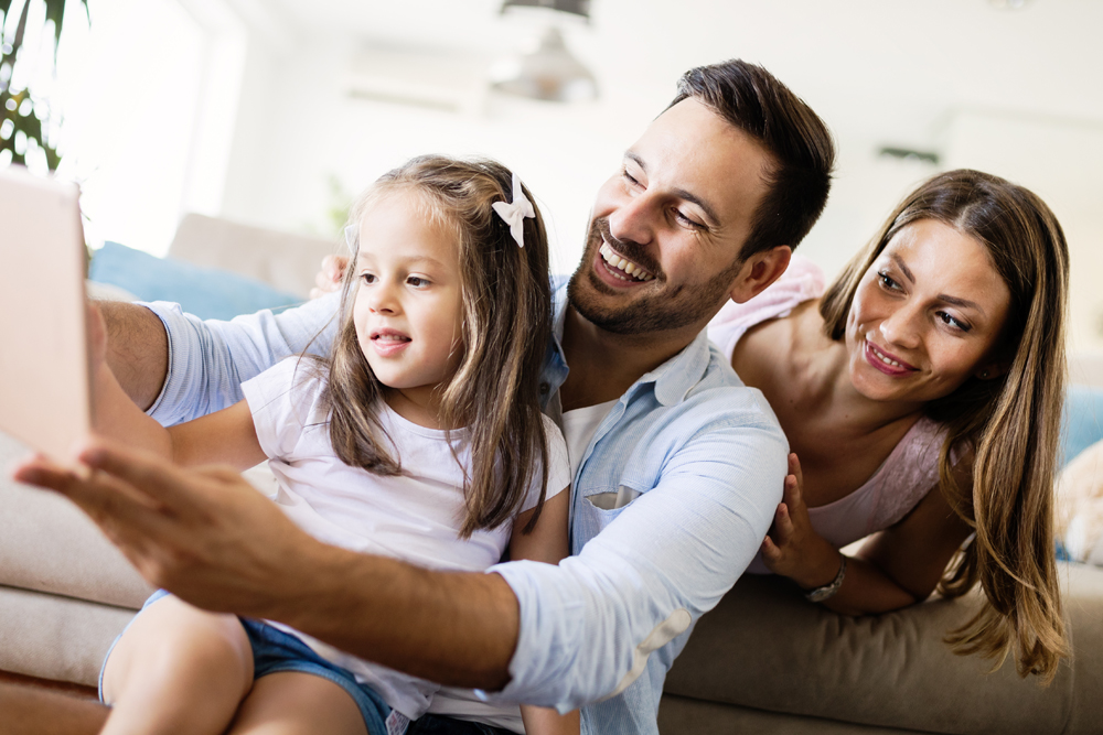 Happy family having fun time at home